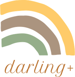 A yellow, brown and green rainbow with "darling+" beneath